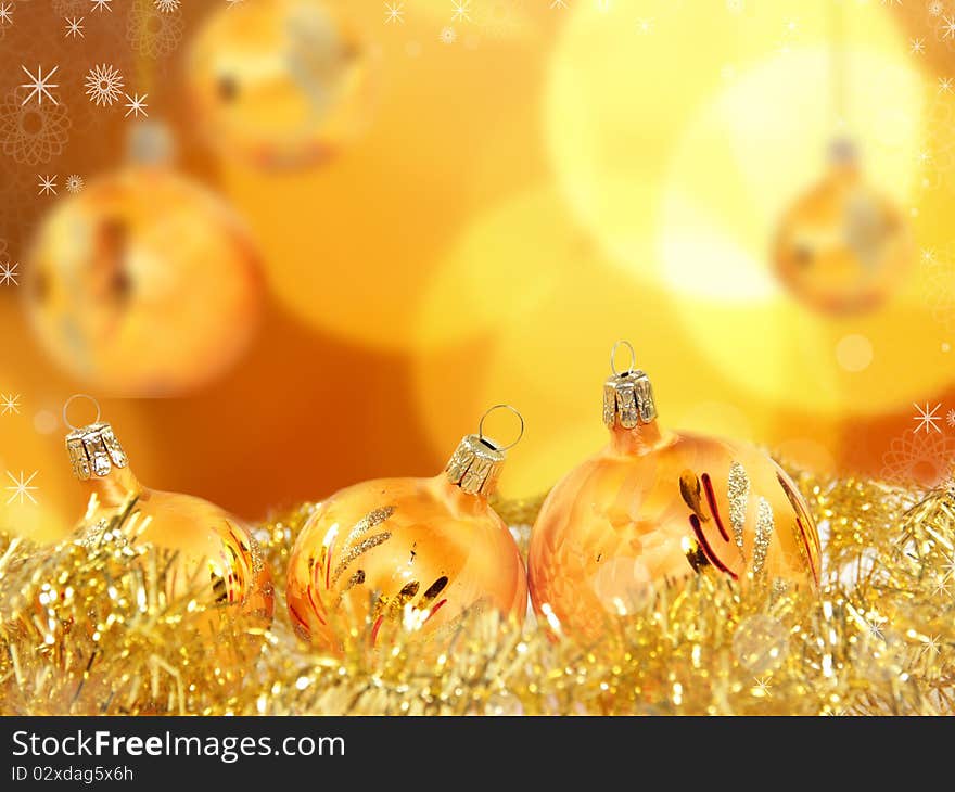 Golden Christmas balls with blur background. Golden Christmas balls with blur background