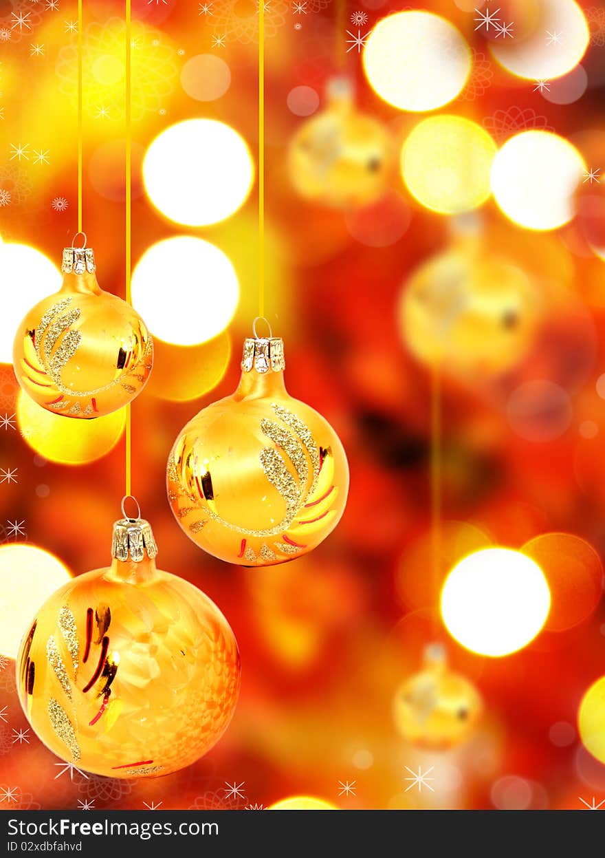 Golden Christmas balls with blur background. Golden Christmas balls with blur background