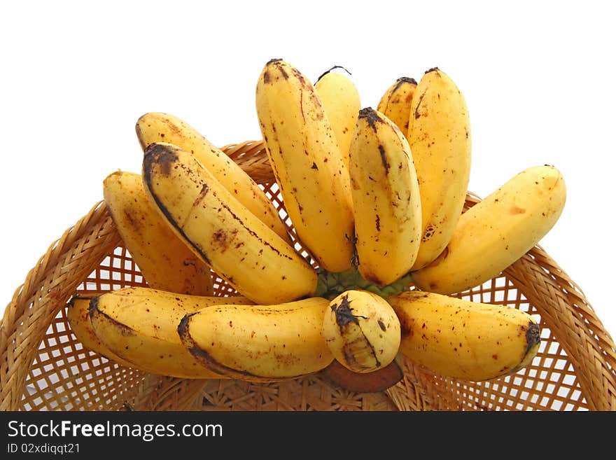 Hand of bananas, tropical Thai fruit, in Basket