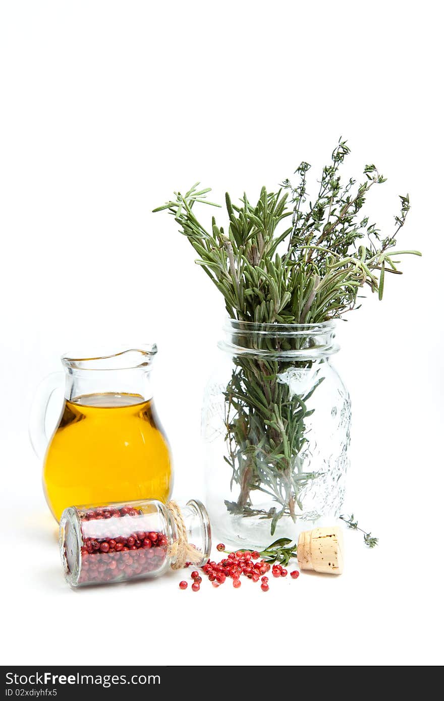 Olive oil with Provence herb on a white background