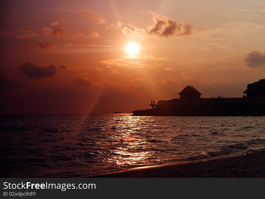 Beautiful sunset, beach and waves