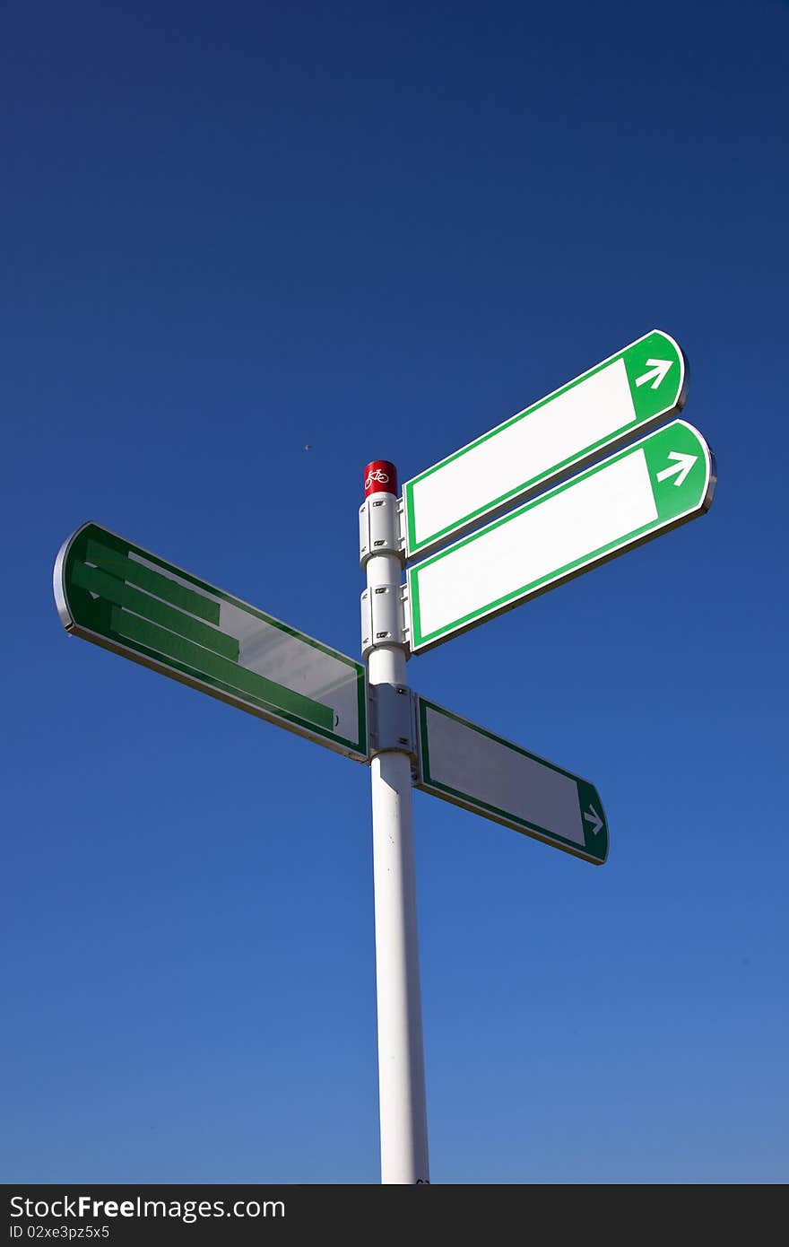 White sign with blue sky