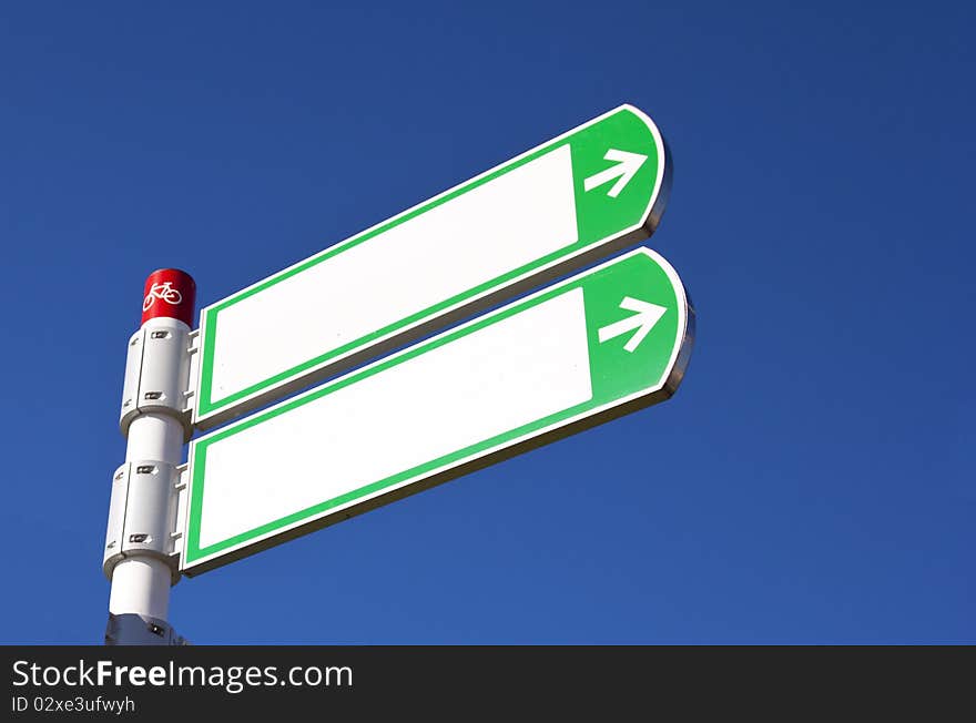 White sign with blue sky