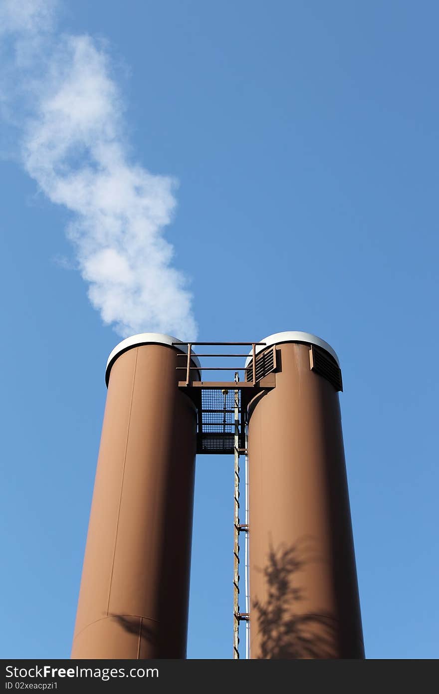 Two tubes on the background of clear sky