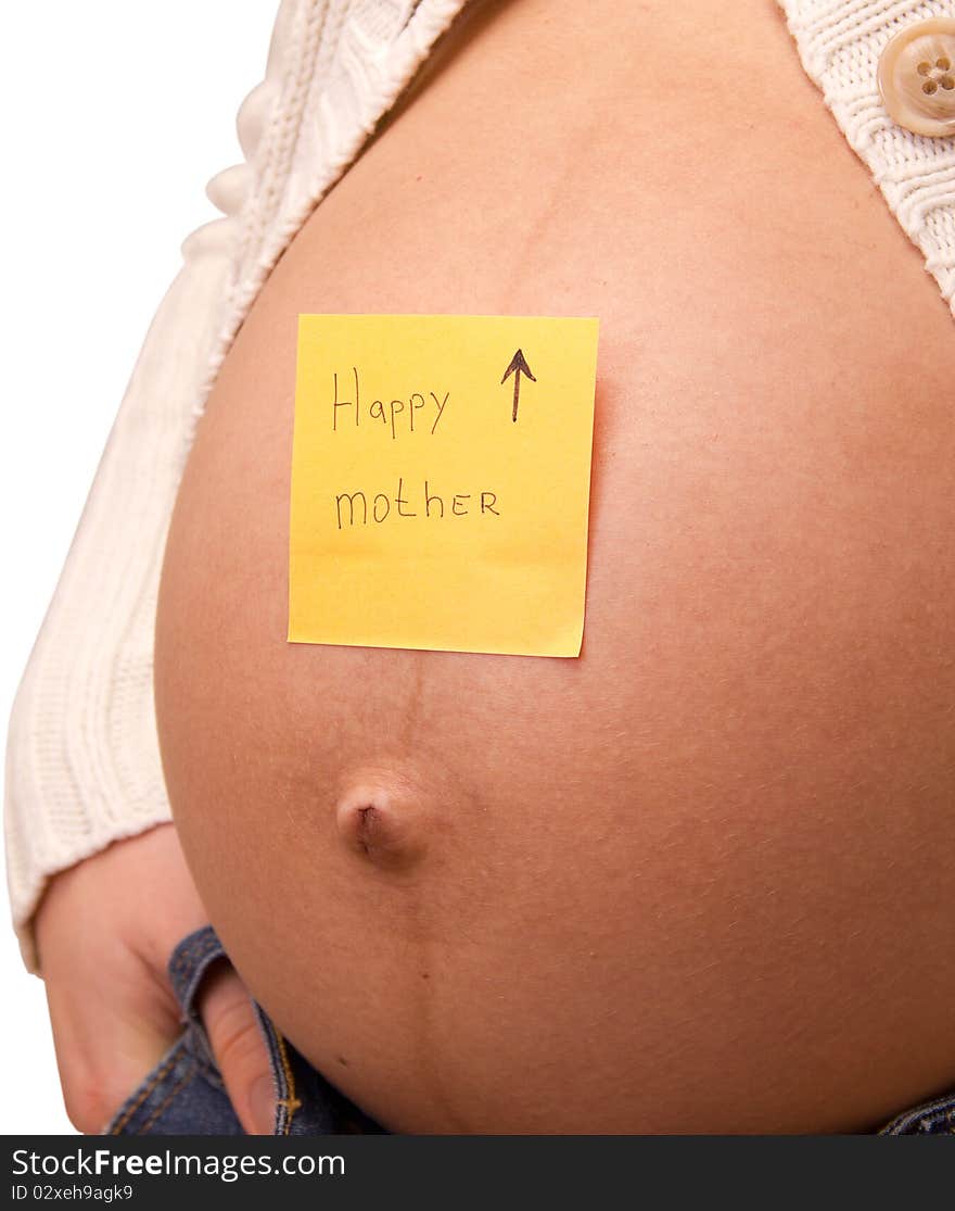 Belly of pregnant woman with happy mother written on it. Belly of pregnant woman with happy mother written on it