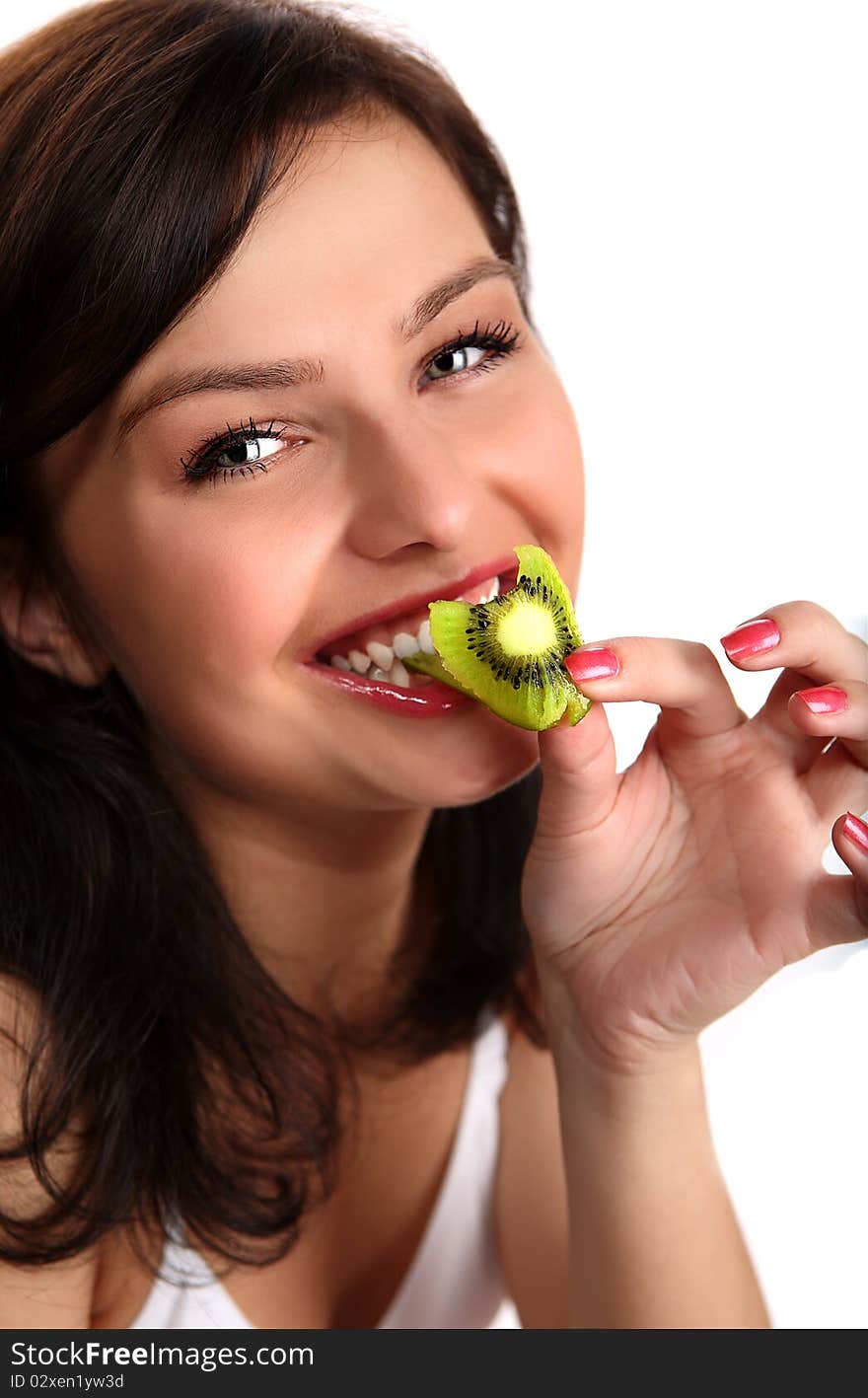 Very beautiful young woman eating healthy food