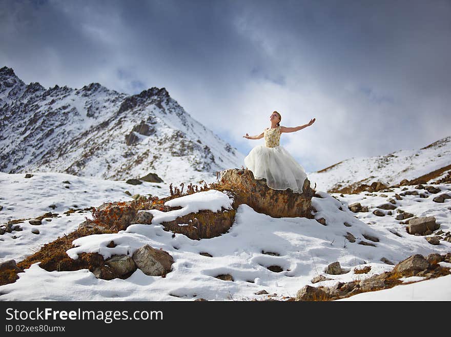 The bride in snow mountains