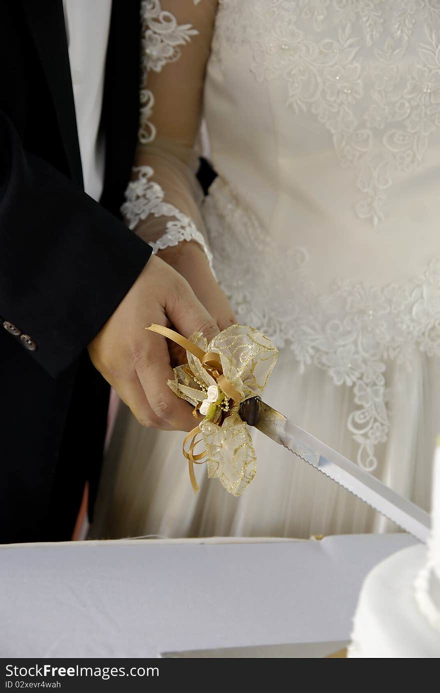 Couple Cutting Cake