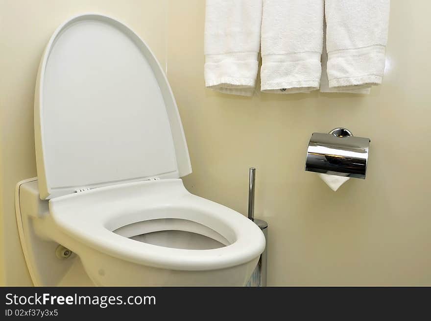 Closeup of generic white toilet seat and bowl. For hygiene and cleanliness concepts. Closeup of generic white toilet seat and bowl. For hygiene and cleanliness concepts.