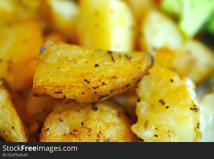 Macro of seasoned potatos