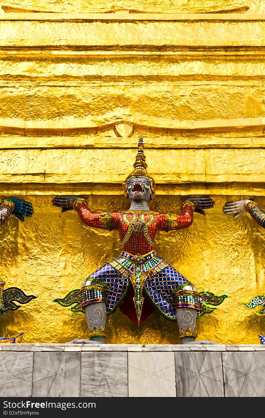 Traditional thai style giant statue in grand palace