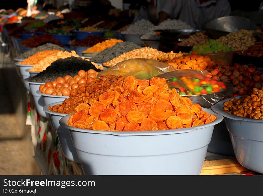 Bowls full of dried fruit on a marketplace