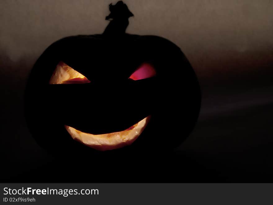 Horror pumpkin face with illuminated