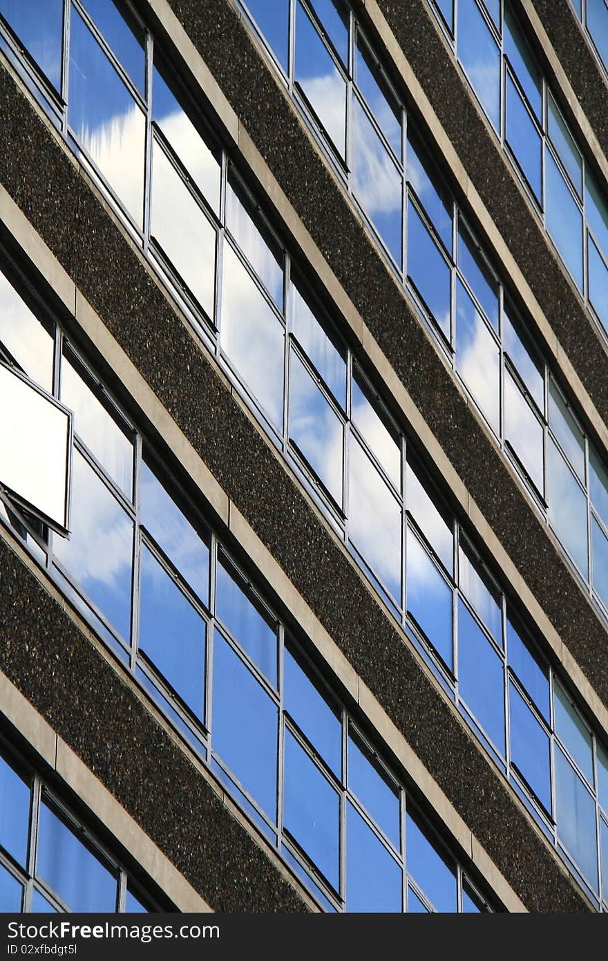 Image of a of a building under the blue sky. Image of a of a building under the blue sky