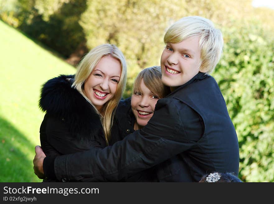 Happy family have fun and stroll in park. Happy family have fun and stroll in park