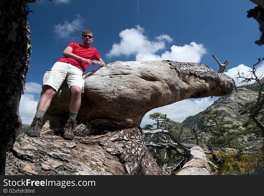 Person hiking the famous path GR20 at Corsica. Person hiking the famous path GR20 at Corsica.