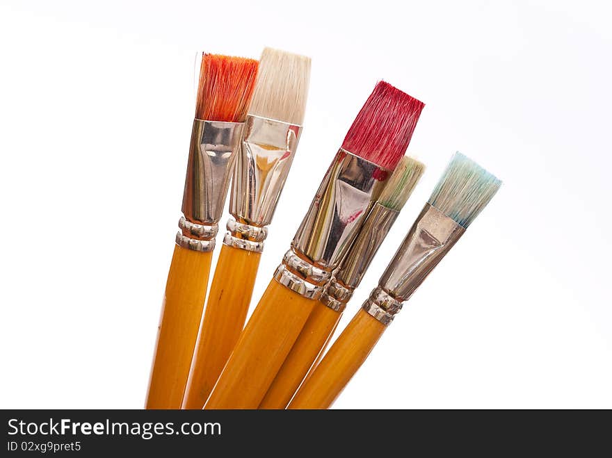 Paint brushes on white background