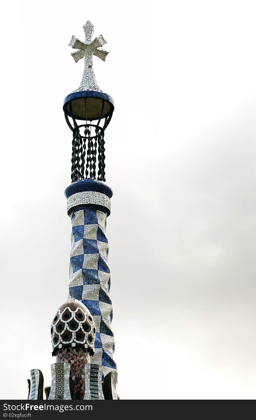 Tower with cross in Parc Guell, Barcelona. Tower with cross in Parc Guell, Barcelona