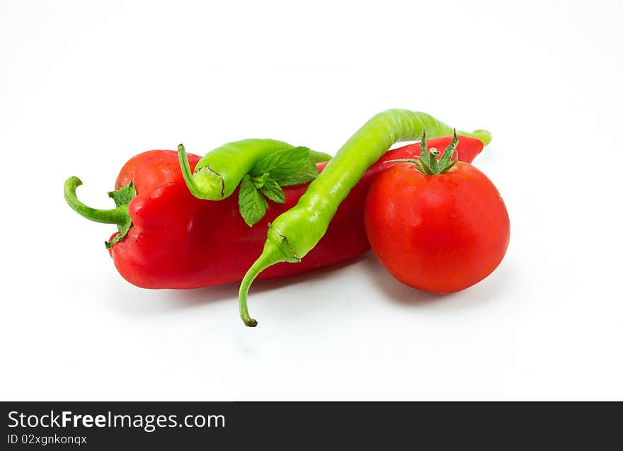 Peppers and Tomatoe on a white background