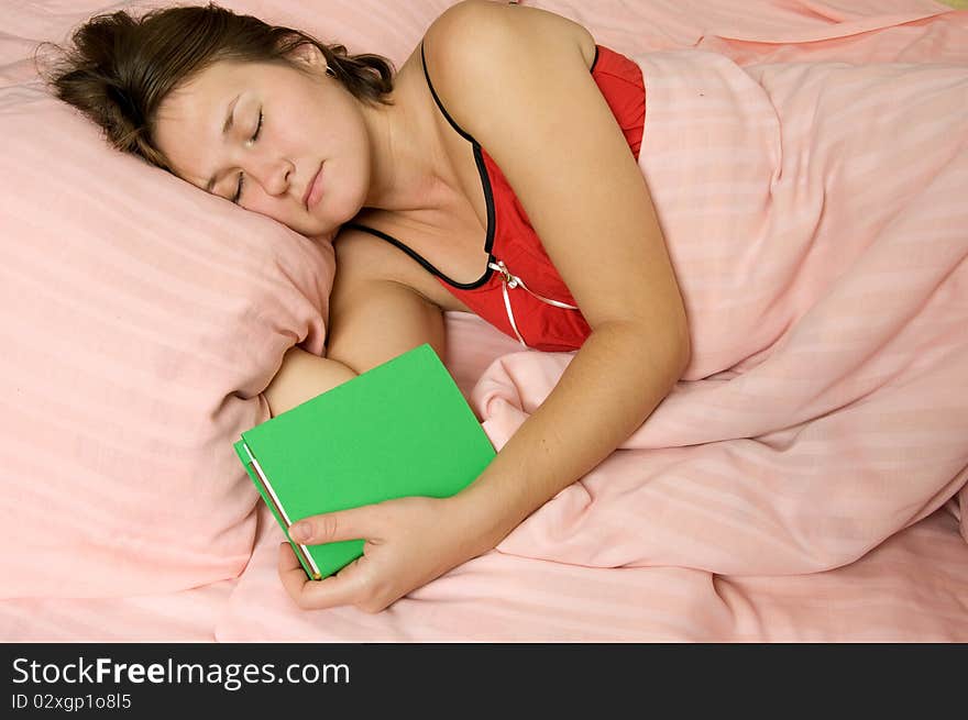 Adorable sleeping woman with book. Adorable sleeping woman with book