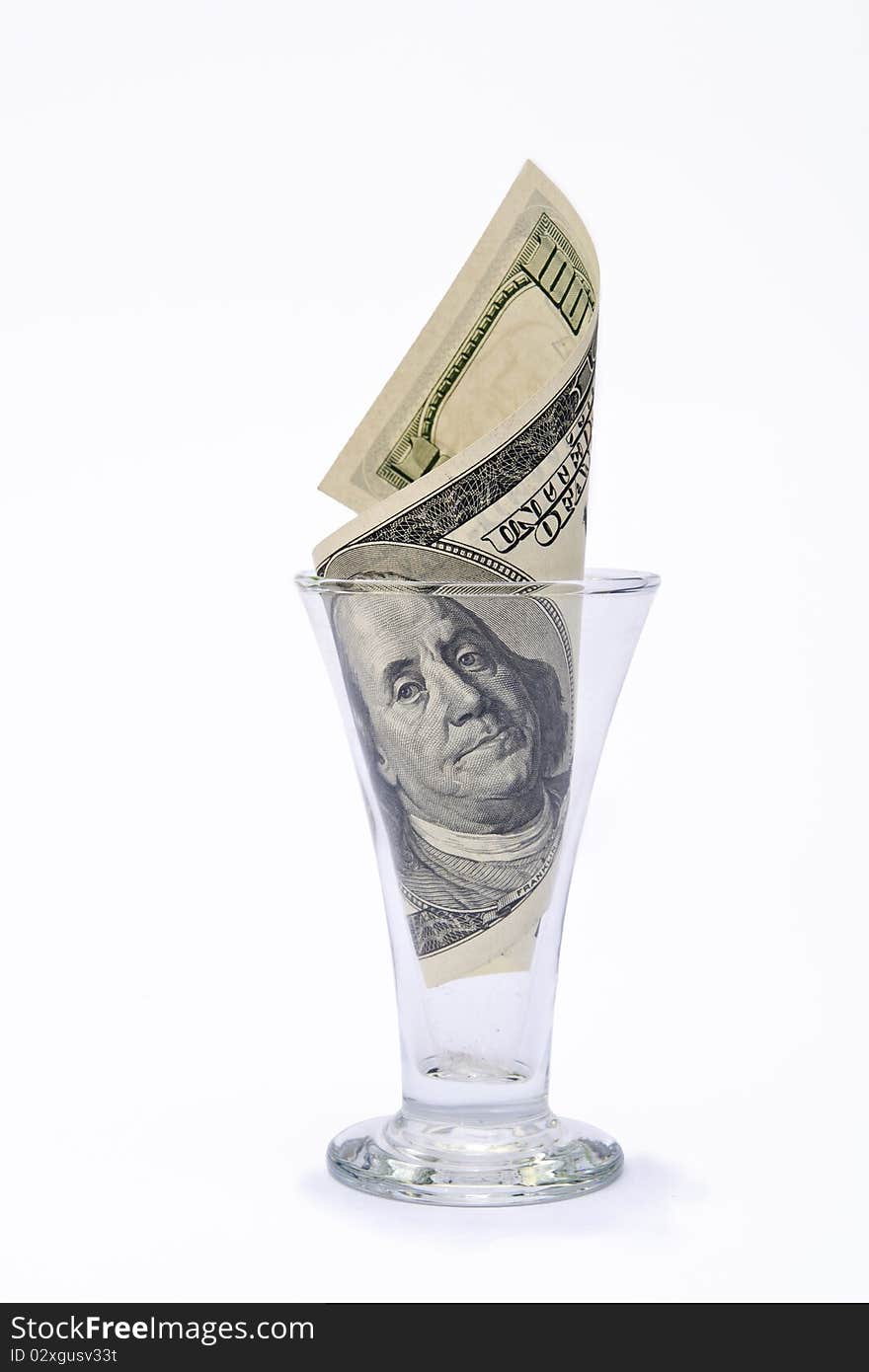 Dollar in glass on white background