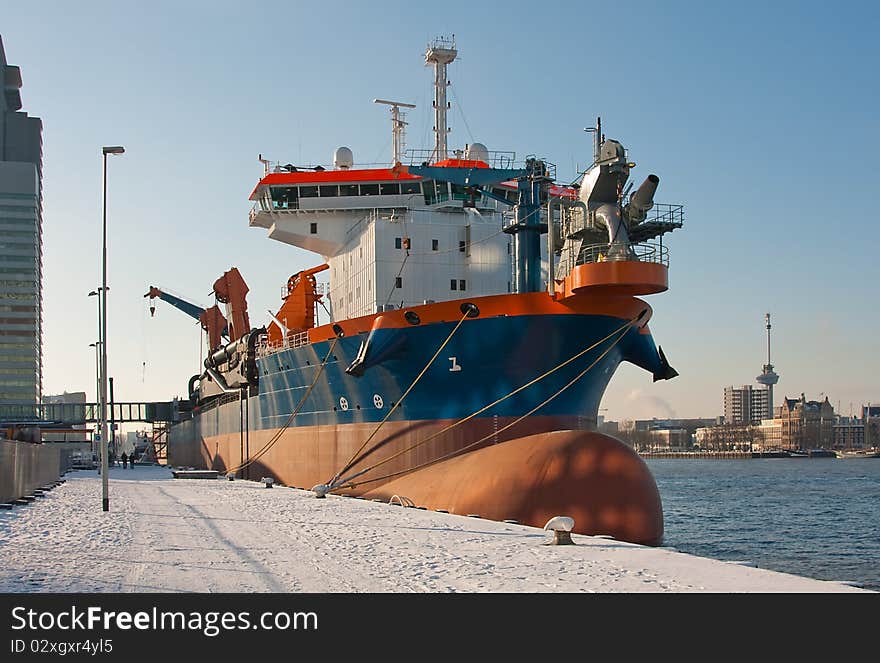 A trailing suction hopper dredger. A trailing suction hopper dredger