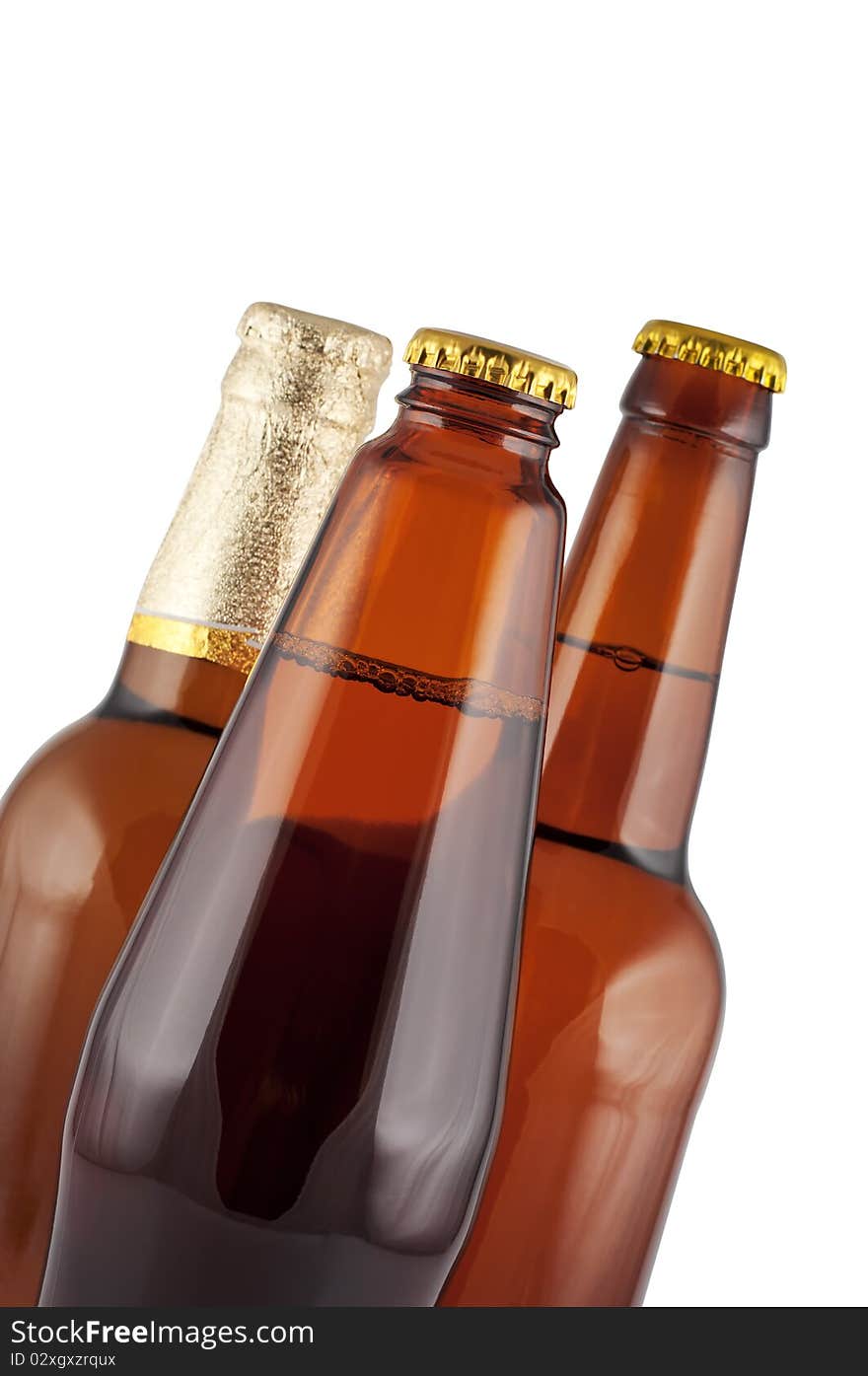 Beer In Bottles Close Up Isolated.