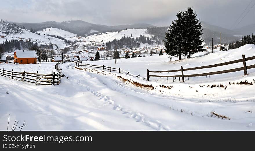 The Small village is high in mountains. The Small village is high in mountains