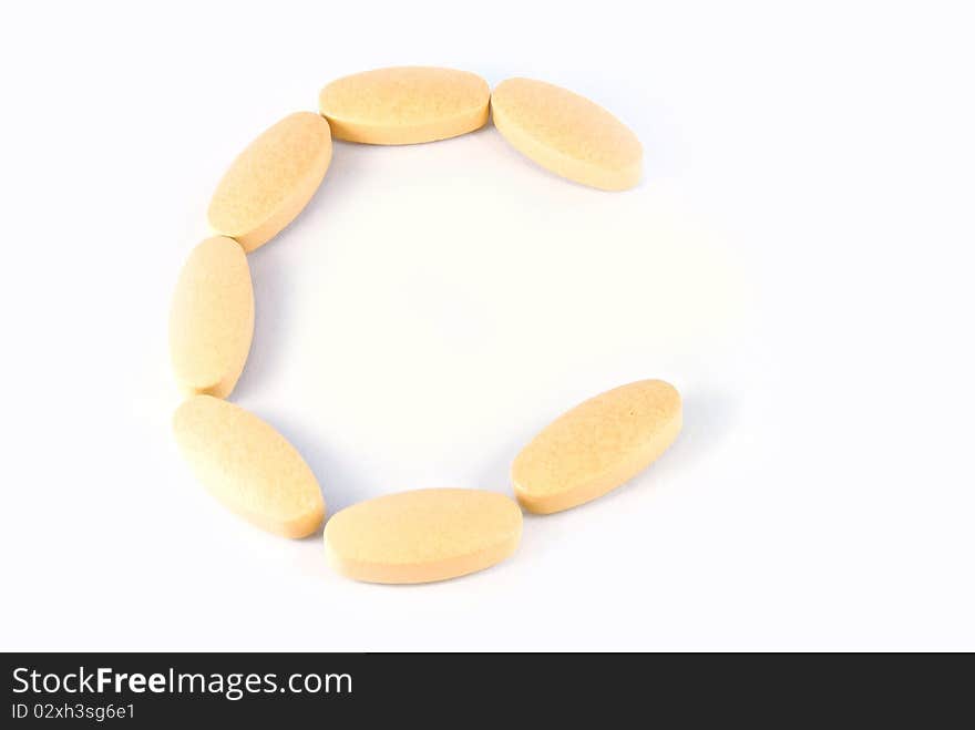 C Letter From C Vitamin Tablets Isolated