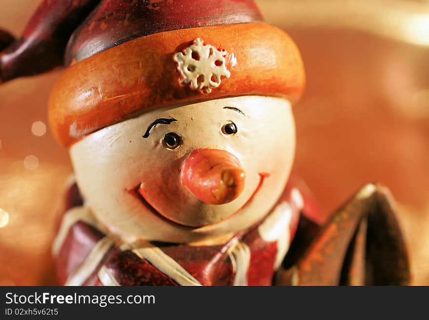 Close-up picture of the face of a snow-man figure. Close-up picture of the face of a snow-man figure