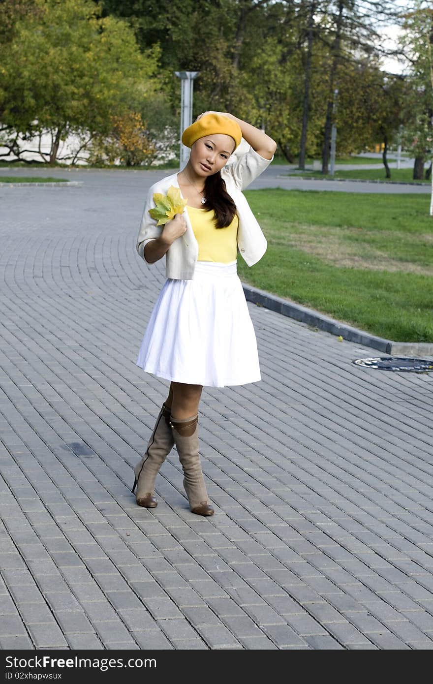 Girl In Autumn Park