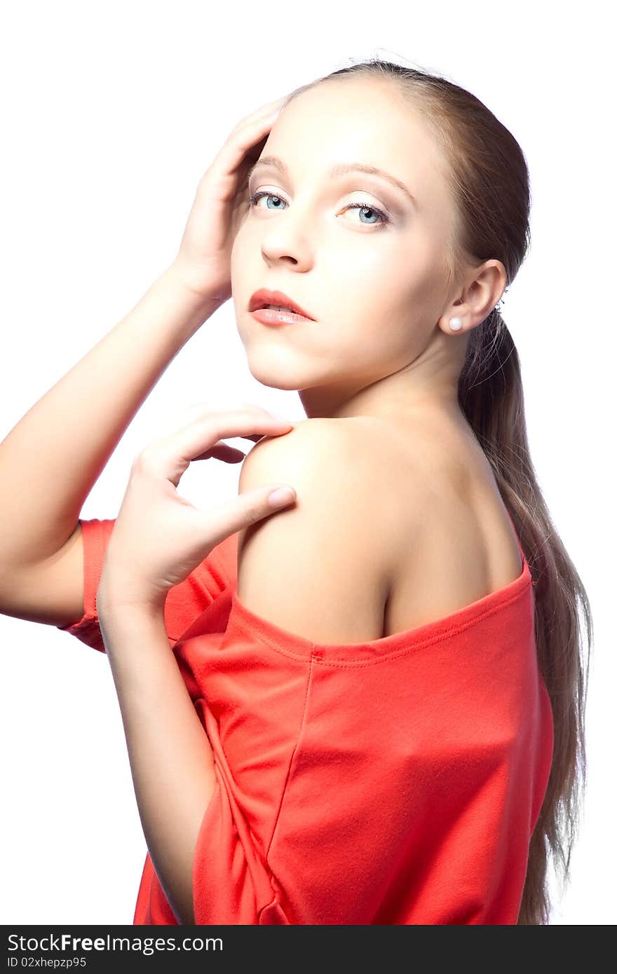 Beautiful woman over white background in red dress. Beautiful woman over white background in red dress