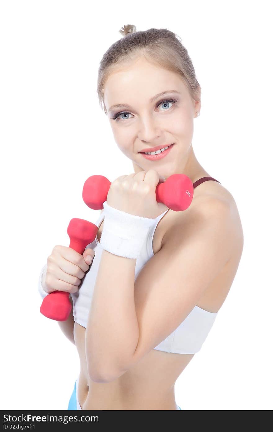 Beautiful woman in fitness over white background. Beautiful woman in fitness over white background