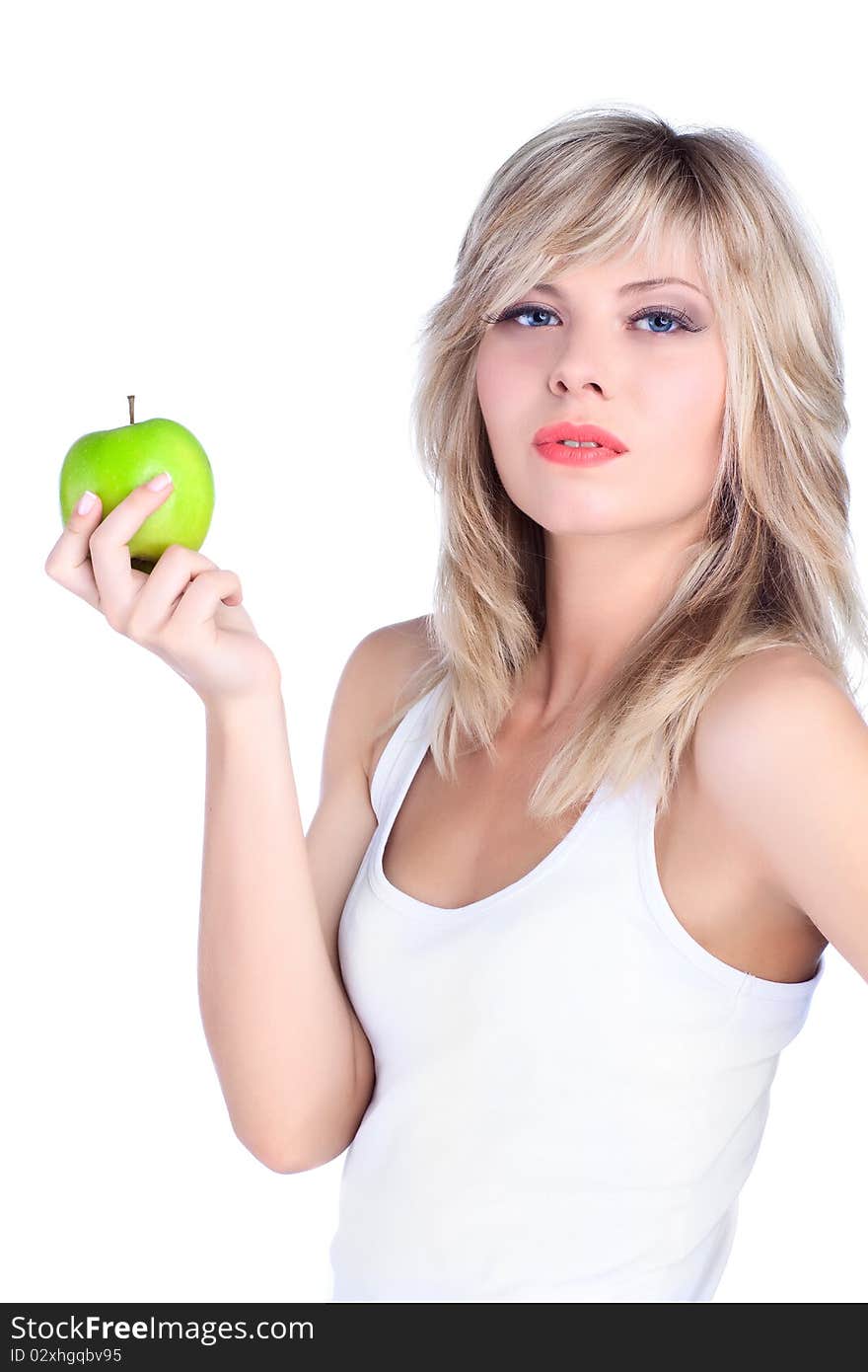 Young girl over white background with apple. Young girl over white background with apple