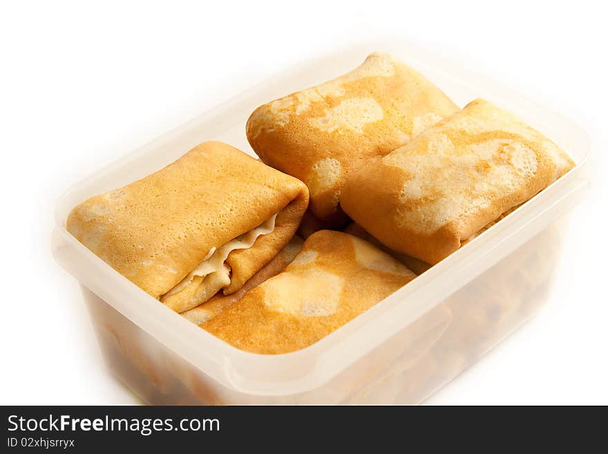 Pancakes with filling in plastic box at 15Mps horizontal