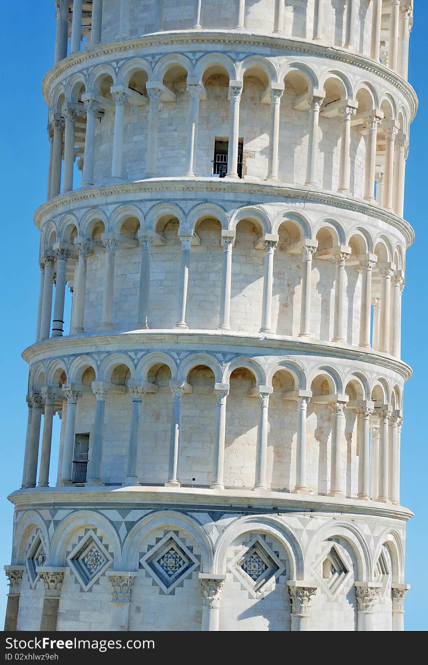 Fragment of the famous leaning tower in Pisa, Italy. Fragment of the famous leaning tower in Pisa, Italy.