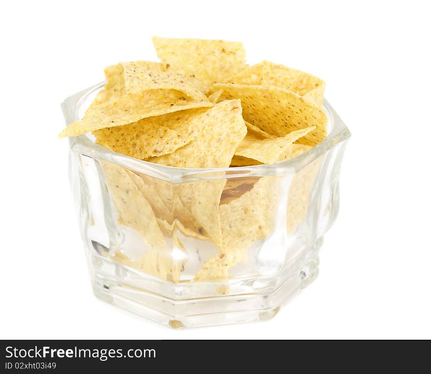 Tortilla chips isolated on white background in vase closeup.