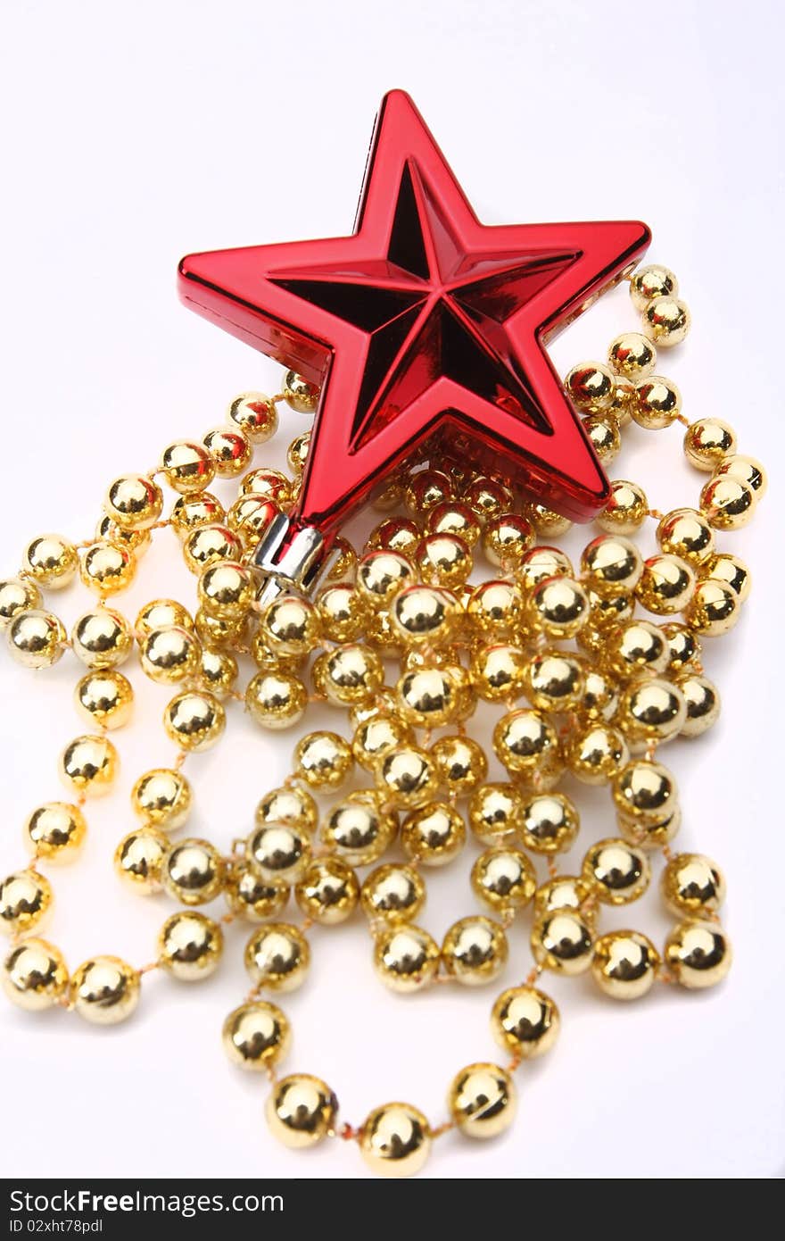 Red christmas star with golden balls isolated on white background. Red christmas star with golden balls isolated on white background