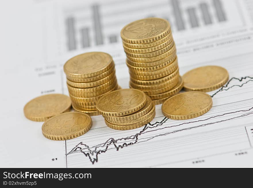 Gold coin graph on the business document