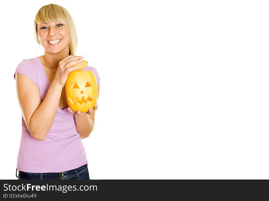 Young girl having fun with a pumpkin on Halloween. Lots of copyspace and room for text on this isolate