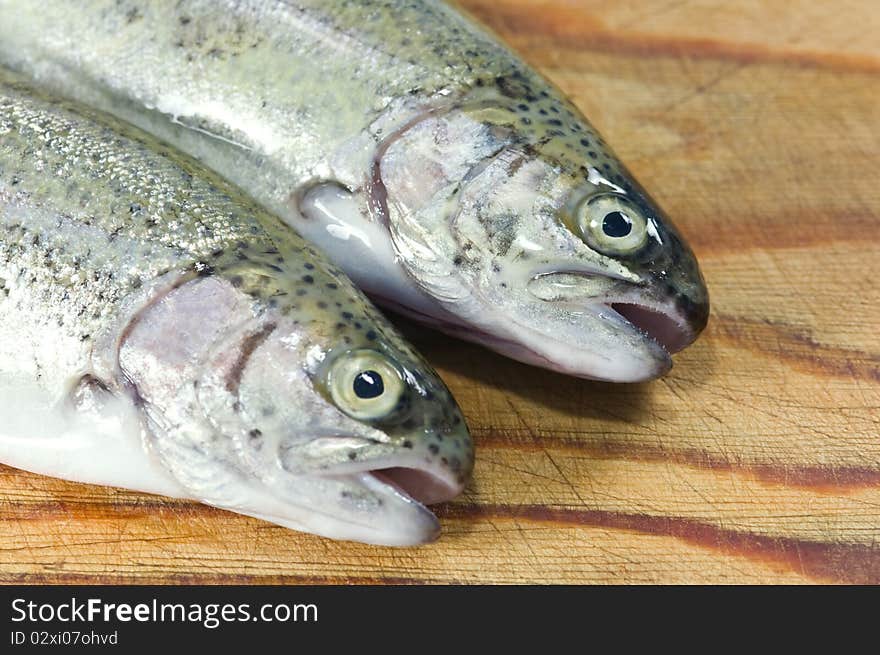 Fresh trout on wood table