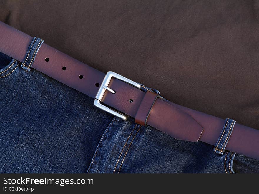 Casual fashion trend Brown shirt and blue jeans with belt. Casual fashion trend Brown shirt and blue jeans with belt