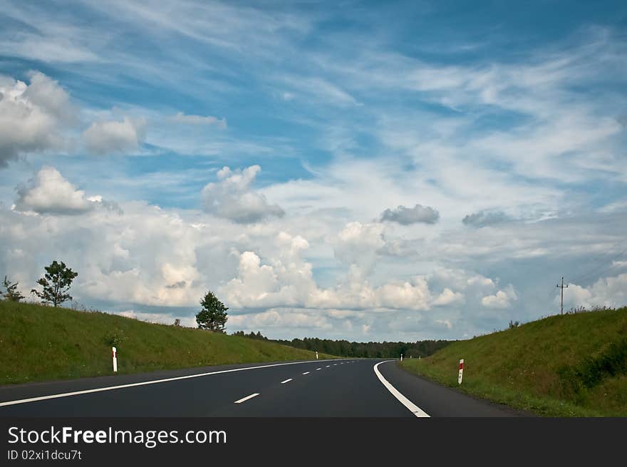 Traveling on empty asphalt road