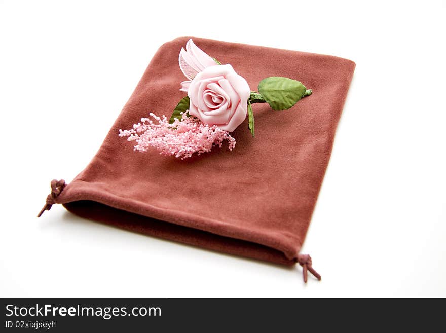 Pink rose onto material bags