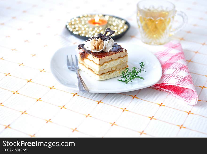 Chocolate dessert with tea and napkin