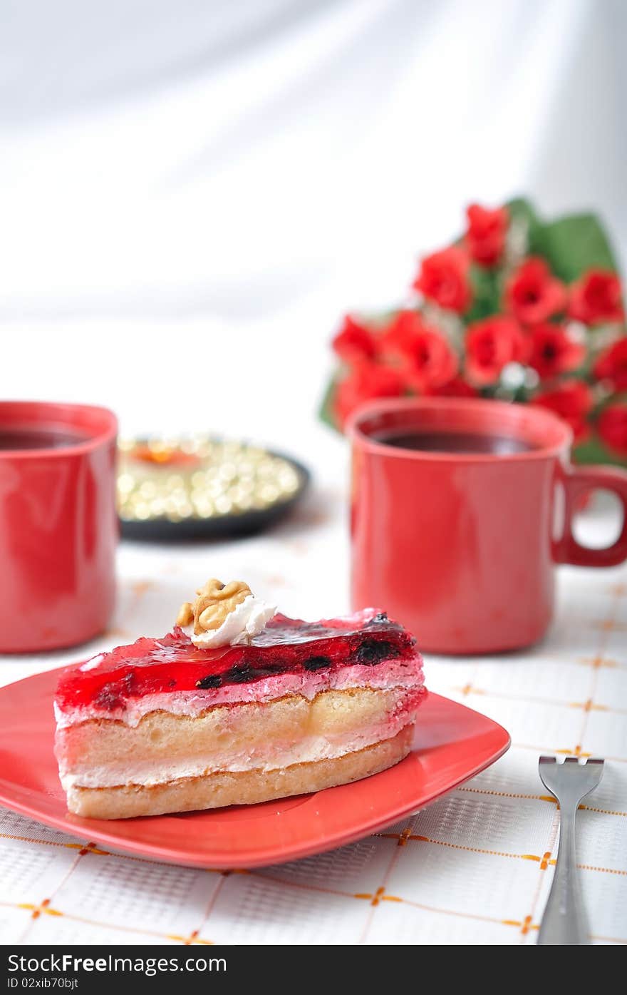 Fruit dessert with tea and napkin