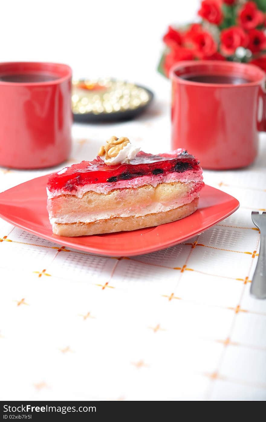 Fruit dessert with tea and napkin