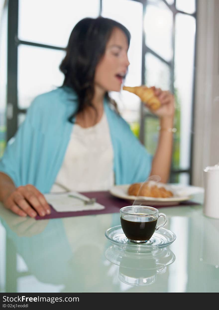 Woman Having Breakfast With Espresso Coffee