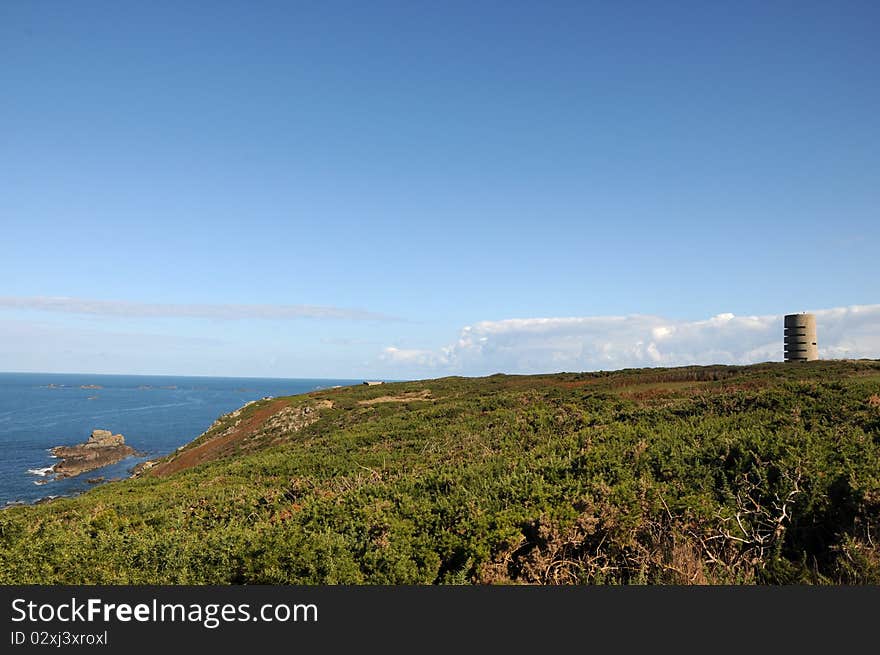 Wartime watchtower of Pleinmont Tower on Guernsey coast