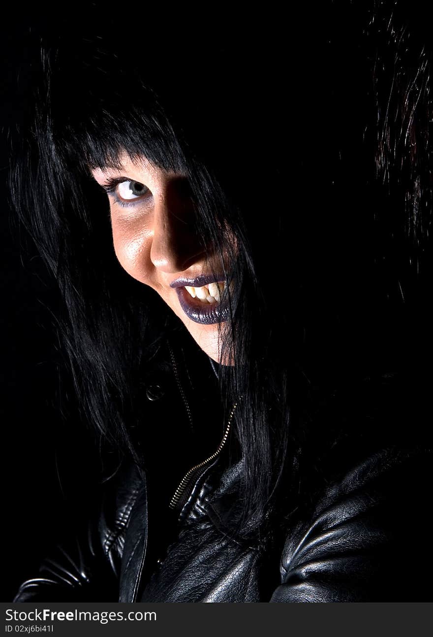 Portrait of smiling gothic woman with black hair. Portrait of smiling gothic woman with black hair